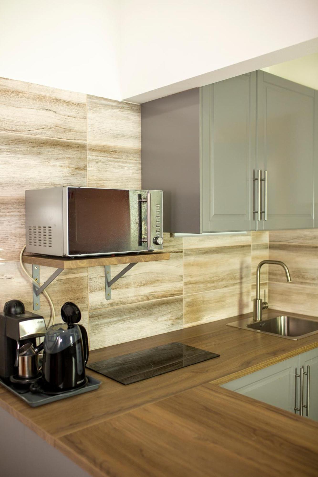 Huerkecz Apartmanhaz เฮวิซ ภายนอก รูปภาพ